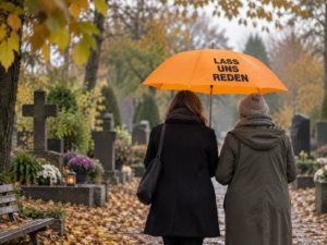 Orangefarbener Schirm der Aktion „Lass uns reden“ auf einem Friedhof (KI-generiertes Bild)